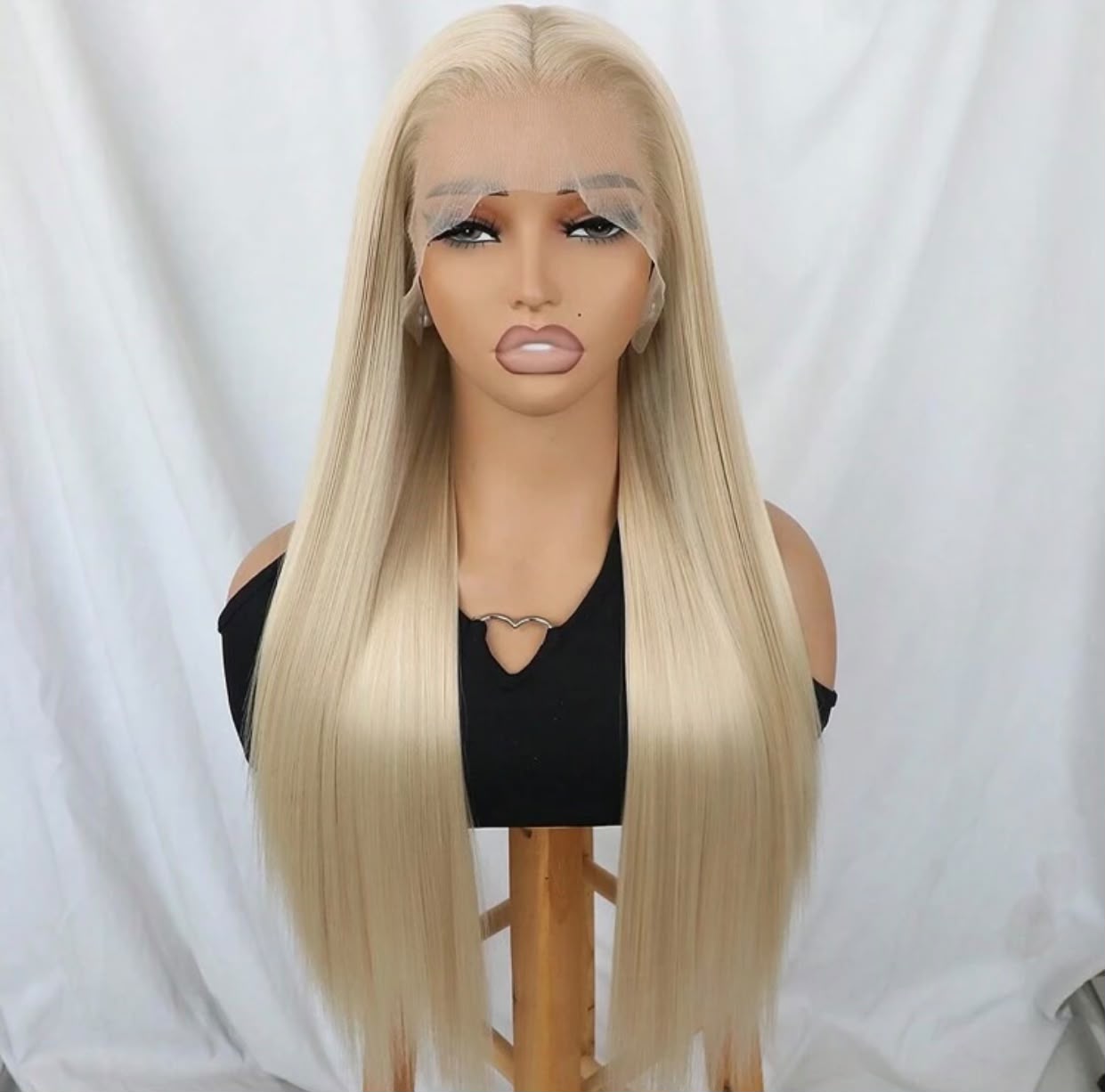 Platinum blonde 13x4 lace frontal wig on a mannequin head