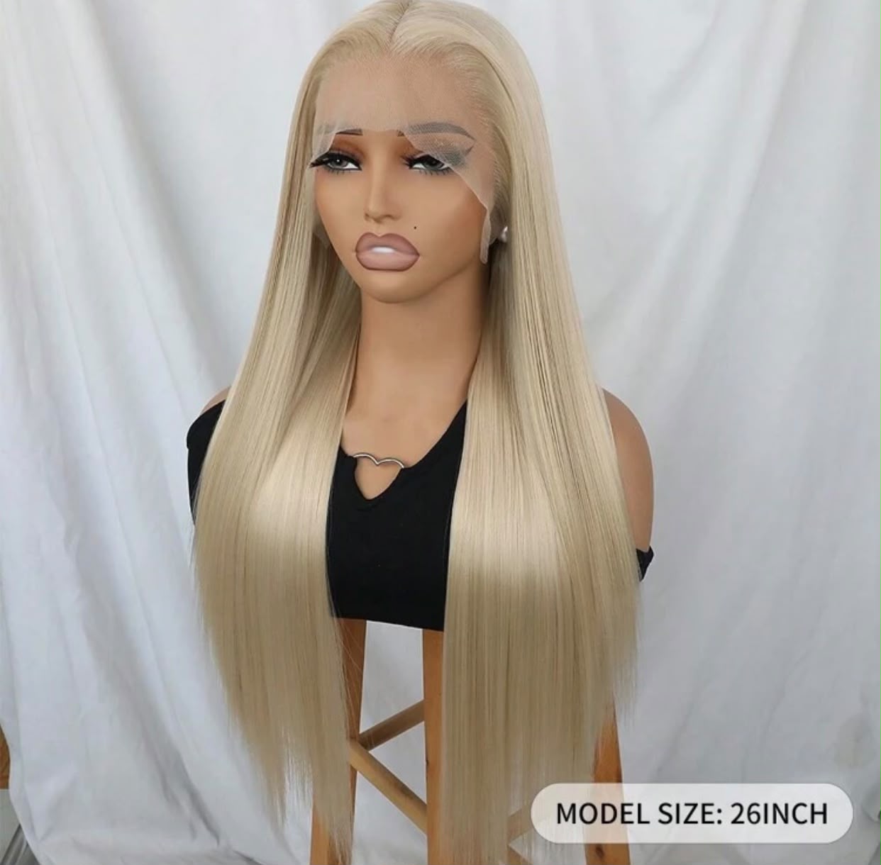 Long straight 613 blonde lace front wig on a mannequin head